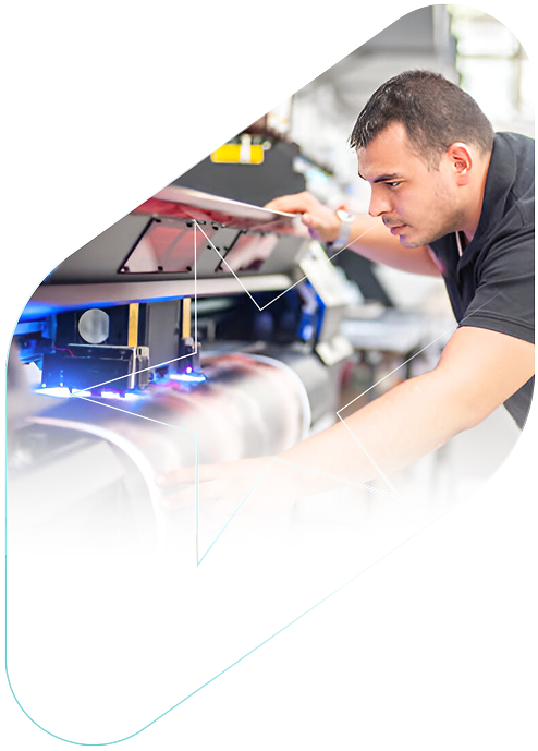 CSPrinting staff operating professional printing equipment in Houston, Texas